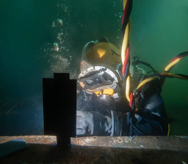 stock image Underwater welding in deep ocean depths closeup
