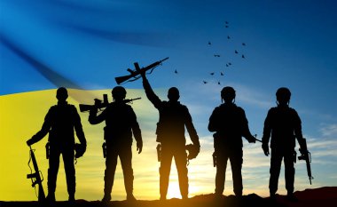 Flag of Ukraine with silhouettes of soldiers against the sunset. Armed forces of Ukraine concept. EPS10 vector