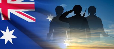 Silhouettes of Soldiers with Australian flag on background of sunset. Concept - Armed Force. EPS10 vector