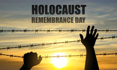 Holocaust Remembrance Day. Silhouette of hand with barber wire on a sunset. January 27. EPS10 vector