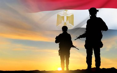 Silhouettes of soldiers against the sunset with Egypt flag. Background for National Holidays. Concept - Armed Forces. EPS10 vector