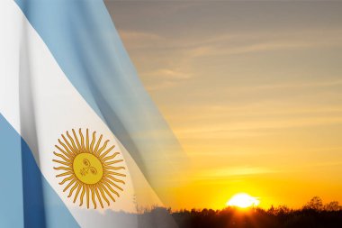 Flag of Argentina against the sunset. Patriotic background clipart