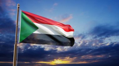 Sudan bayrağı günbatımına karşı rüzgarda dalgalanıyor