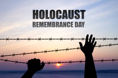 Soykırım Anma Günü. Gün batımında berber telli el silueti