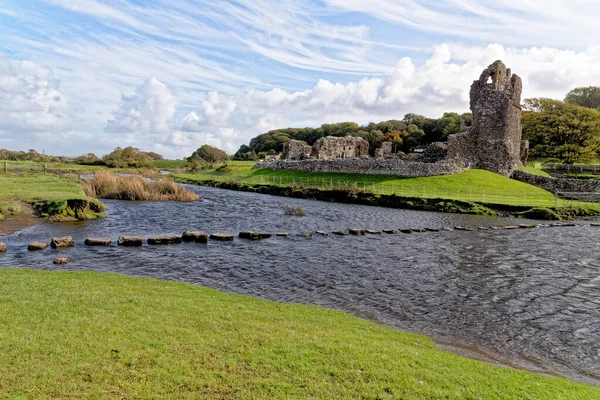 stock image Ruins of Ogmore Castle in Vale of Glamorgan river. Ogmore by Sea, Glamorgan, Wales, United Kingdom