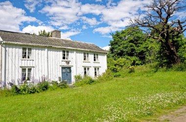 Beautiful landscape of Traditional Norwegian house in a sunny day - Andalsnes - Norway