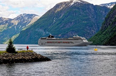 MSC Lirica Cruise ship in Norwegian Fjords - Geiranger fjord - Hellesylt, Sunnylvsfjord, Norway, Scandinavia. Travel destination Norway. 02.07.2012