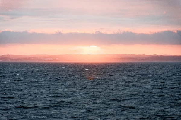 Sunset over Stavenger harbor - Norway. Travel destination North of Europe