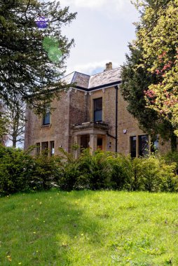 Güneşli bir günde Nunney köyünün manzarası, Somerset, İngiltere, Birleşik Krallık - 8 Nisan 2023