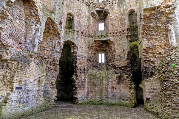 stock image Inside walls of Nunney Castle and moat in the village of Nunney. Built in the 1370s by Sir John de la Mere, Somerset, England, United Kingdom - 8th of April 2023