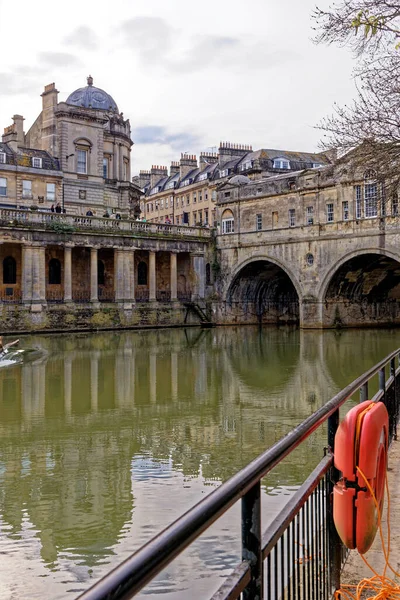 stock image Travel destination United Kingdom - The Weir and Pulteney Bridge on river Avon in Bath, Somerset, England - 8th of April 2023