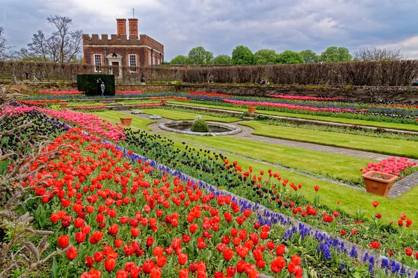 stock image Hampton Court Palace Gardens - Pond gardens and Banqueting House - Hampton Court Palace, London, England, United Kingdom. 22nd of April 2023