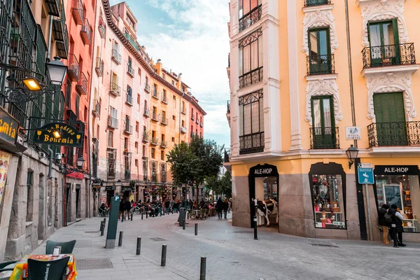 stock image Madrid, Spain - FEB 19, 2022: A vibrant weekend morning on the Calle Cava de San Miguel, a street between the Plaza Mayor and San Miguel food market.