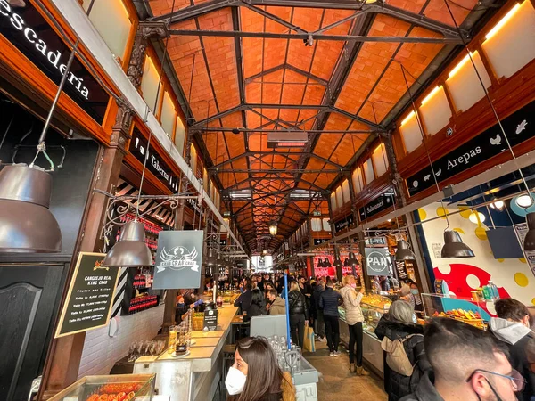 stock image Madrid, Spain - FEB 19, 2022: Mercado de San Miguel is a covered market located in Madrid, Spain. Originally built in 1916, renovated and reopened it in 2009.