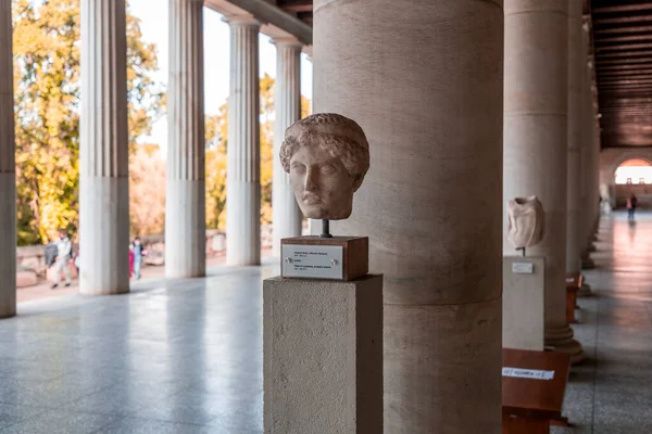 stock image Athens, Greece - 25 Nov 2021: The ancient articts displayed at the Stoa of Attalos, a covered portico in the Agora of Athens.