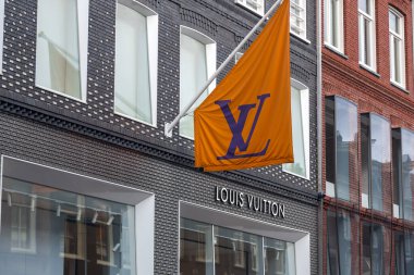Amsterdam, the Netherlands - October 12, 2021: Store front of Louis Vuitton, international luxurious brand, Amsterdam branch. clipart