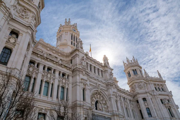 stock image Madrid, Spain-Feb 16, 2022: Cibeles Palace, formally known as Palacio de Comunicaciones is a complex composed of two buildings with white facades at Cibeles Square, Madrid.