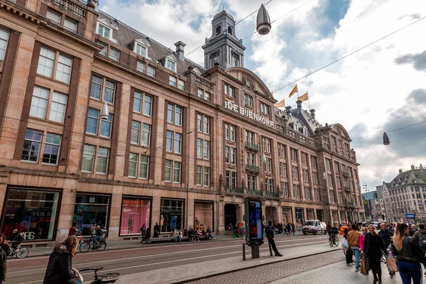 stock image Amsterdam, the Netherlands - October 10, 2021: Exterior view of De Bijenkorf Amsterdam building located on the main entrance of Damrak, Amsterdam, the capital of the Netherlands.