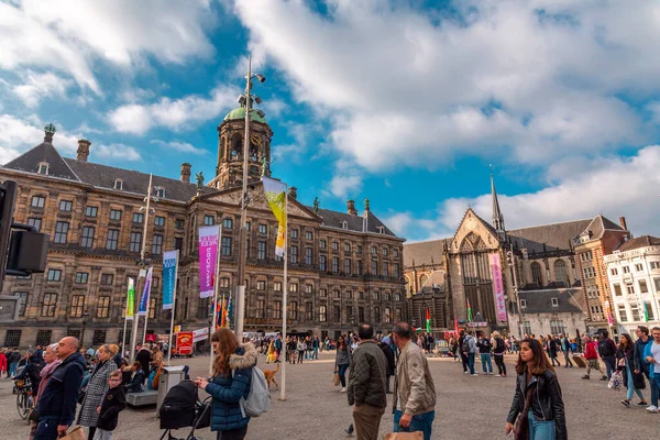 stock image Amsterdam, NL - OCT 10, 2021: The Royal Palace of Amsterdam at Dam Square is one of three palaces in the Netherlands which are at the disposal of the monarch by Act of Parliament.