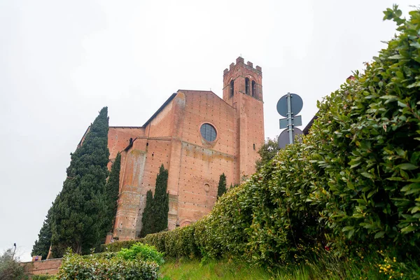 stock image San Francesco is a gothic style basilica church erected in 1228-1255 and later enlarged in the 14th-15th centuries in Siena, Tuscany, Italy.