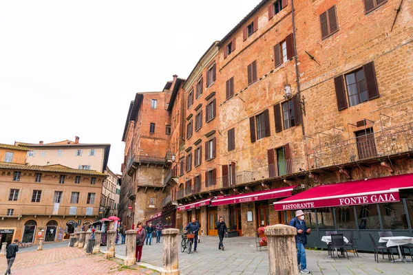 stock image Siena, Italy - APR 7, 2022: The Piazza del Campo, the central square of Siena, Tuscany, Italy.