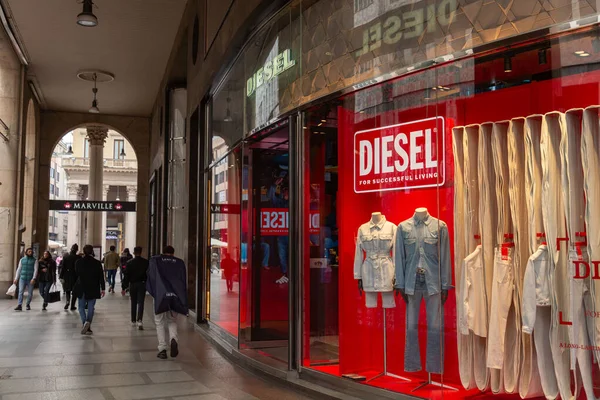 stock image Milan, Italy - 30 March 2022: Buildings, offices and luxury fashion stores at the Piazza San Babila, in the centre of Milan, Italy.