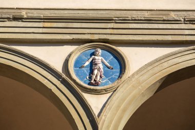 Florence, Italy - April 5, 2022: Ospedale degli Innocenti, Hospital of the Innocents is a historic building, currently hosting the UNICEF Innocenti Research Centre. clipart