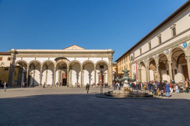 Florence, Italy - April 5, 2022: Ospedale degli Innocenti, Hospital of the Innocents is a historic building, currently hosting the UNICEF Innocenti Research Centre. clipart
