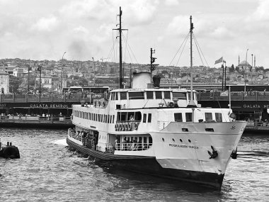 Istanbul, Turkiye - 17 JUN 2023: Ferries carrying passengers between the Asian and European sides of Istanbul on the Bosphorus. clipart