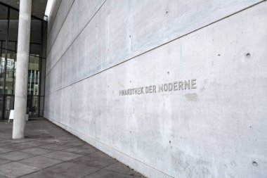 Munich, Germany - DEC 23, 2021: Facade of the New Pinakothek, the modern art museum of Munich, Bavaria, Germany. clipart