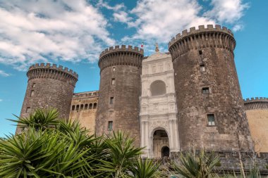 Castel Nuovo or Maschio Angioino is a medieval castle located in front of Piazza Municipio and the city hall in Naples, Campania, Italy. clipart