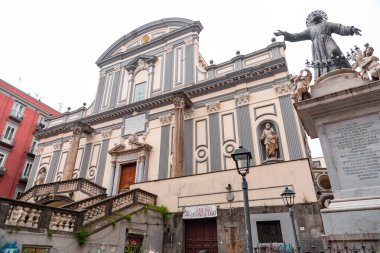 Naples, Italy - April 9, 2022: San Paolo Maggiore is a basilica church in Naples, southern Italy, and the burial place of Gaetano Thiene. clipart