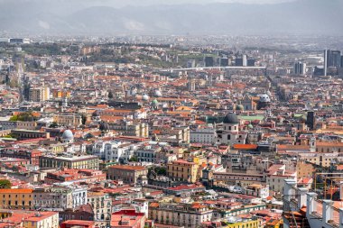 Naples, Italy - April 9, 2022: Aerial cityscape view of the city of Naples, from castel Sant'Elmo, Campania, Italy. clipart