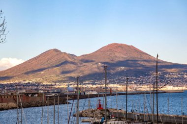 Naples, Italy - April 10, 2022: Mount Vesuvius is a somma-stratovolcano located on the Gulf of Naples in Campania, Italy. clipart