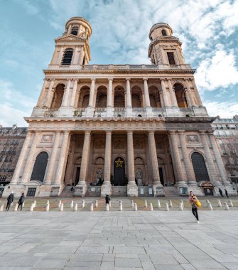 Paris, France - January 20, 2022: The Church of Saint-Sulpice is a Roman Catholic church on the east side of Place Saint-Sulpice, in the Latin Quarter of the 6th arrondissement. clipart