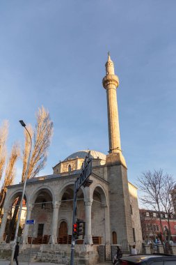 Pristina, Kosovo - February 5, 2024: Sultan Murat Mosque is an Ottoman Empire period mosque in the center of Pristina city, the capital of Kosovo. clipart