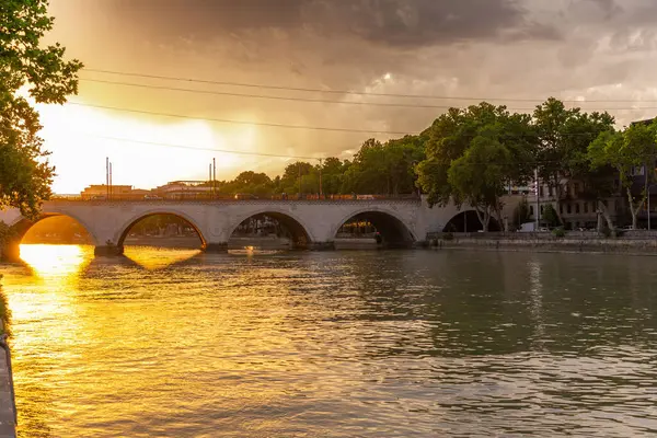 stock image Tbilisi, Georgia - 16 JUNE, 2024: Saarbrucken Bridge on Kura River in Tbilisi, Georgia.