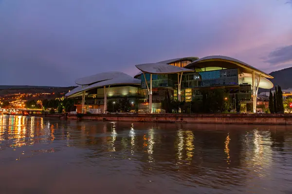 stock image Tbilisi, Georgia - 16 JUNE, 2024: Public Service Hall is an agency of the Georgian government which provides a variety of public services, along the Kura River, Tbilisi.