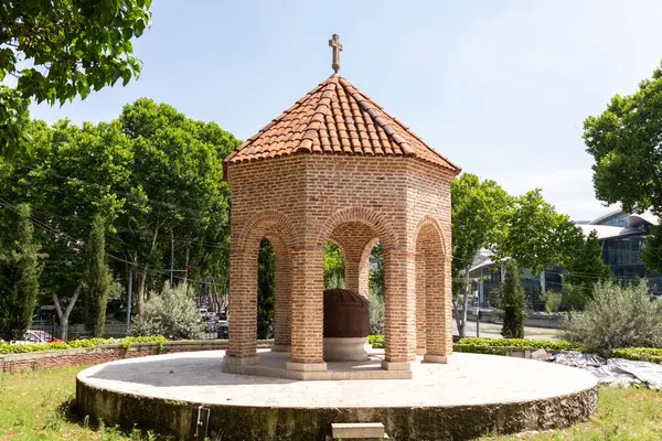 stock image Tbilisi, Georgia - 17 JUNE, 2024: Exterior view of the St. Nicholas Georgian Orthodox Church along the Kura River in Tbilisi, Georgia.