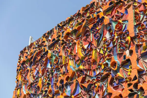 stock image Tbilisi, Georgia - 16 JUNE, 2024: Colourful mosaic facade of Auditorium of the industrial technical college in Tbilisi, Georgia.