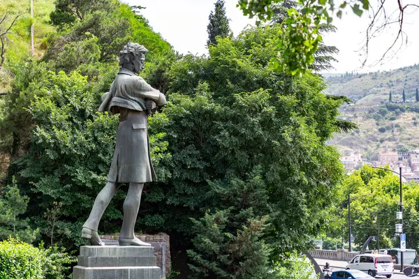 stock image Tbilisi, Georgia - 16 JUNE, 2024: Bronze statue of Nikoloz Baratashvili, a famous 19th century Georgian poet and nobleman.