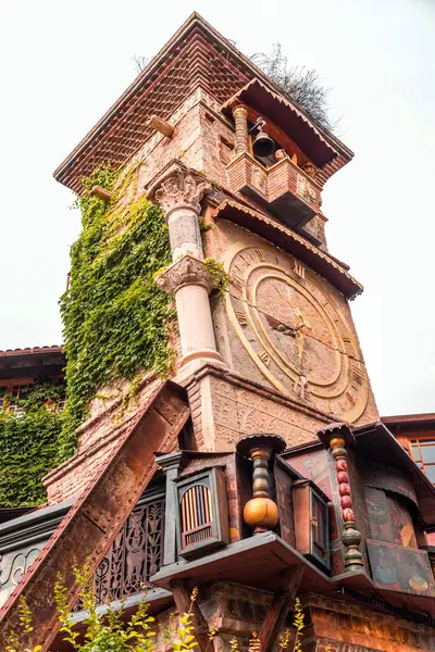 Stock image Tbilisi, Georgia - 17 JUNE, 2024: The Clock Tower of the Rezo Gabriadze Marionette Theater is a unique and iconic landmark located in Tbilisi, Georgia.