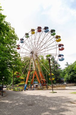 Kutaisi, Georgia - June 15, 2024: Besik Gabashvili Park is an amusement park overlooking the city of Kutaisi, Georgia. clipart