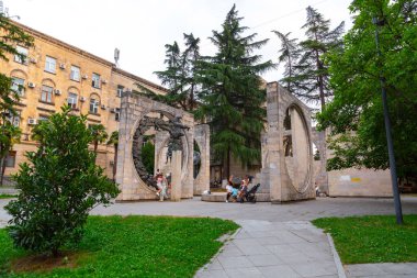 Kutaisi, Georgia - June 15, 2024: Glory to Labour Monument, Soviet style sculpture complex in the centre of Kutaisi created in 1980 by sculptors E. Amashukeli and I. Bastanashvili. clipart