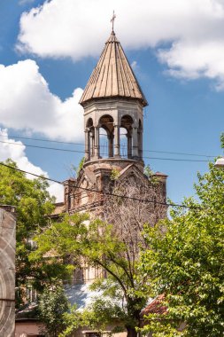 Tbilisi, Georgia - 17 JUNE, 2024: The bell tower of the Church of the Holy Mother of God of the Mens Monastery, or Pashavank Armenian Apostolic churc in Tbilisi. clipart