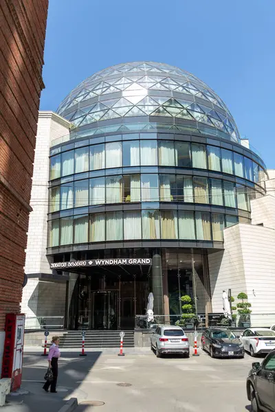 stock image Tbilisi, Georgia - 23 JUNE, 2024: Exterior facade of the Wyndham Grand Hotel at the Liberty Square, Tbilisi, the capital of Georgia.