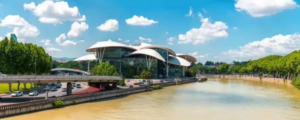 stock image Tbilisi, Georgia - 23 JUNE, 2024: Public Service Hall is an agency of the Georgian government which provides a variety of public services, along the Kura River, Tbilisi.