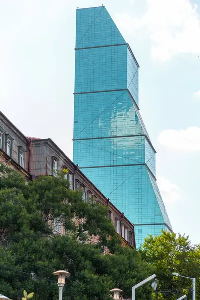 stock image Tbilisi, Georgia - 23 JUNE, 2024: Entrance of the Biltmore Hotel Tbilisi, the first glass skyscraper of Georgia, located on Rustaveli Avenue.