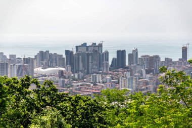 Batumi, Georgia - 13 JUNE 2024: Aerial view of the city of Batumi from the top of the Anuria Mountain. Batumi is the capital of the Autonomous Republic of Adjara. clipart