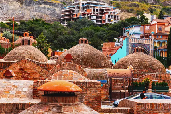 stock image Tbilisi, Georgia - 21 JUNE, 2024: Abanotubani meaning the bath district, is the ancient district of Tbilisi, Georgia, known for its sulphuric baths.